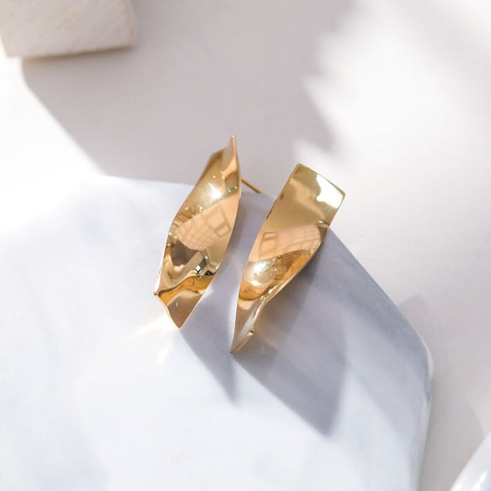 Boucles d'oreilles dorées rectangle tourné